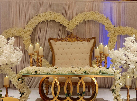 Gold and white loveseat
